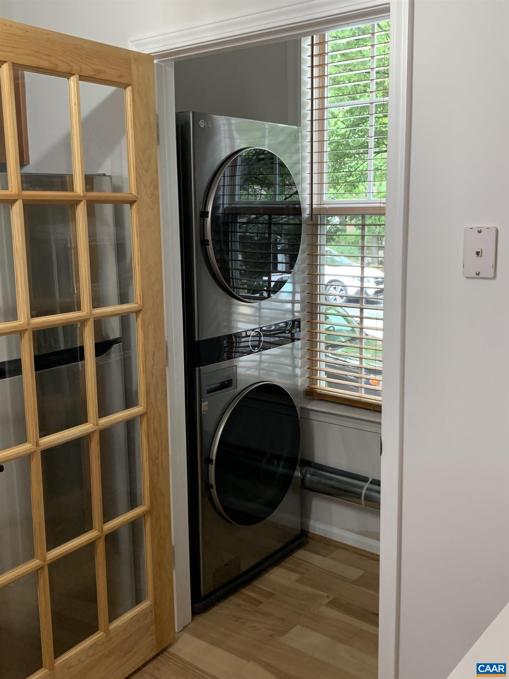 710 Walker Square, Unit 2B Charlottesville, VA 22903 - Photo 3 of 11 a view of living room with washer and dryer