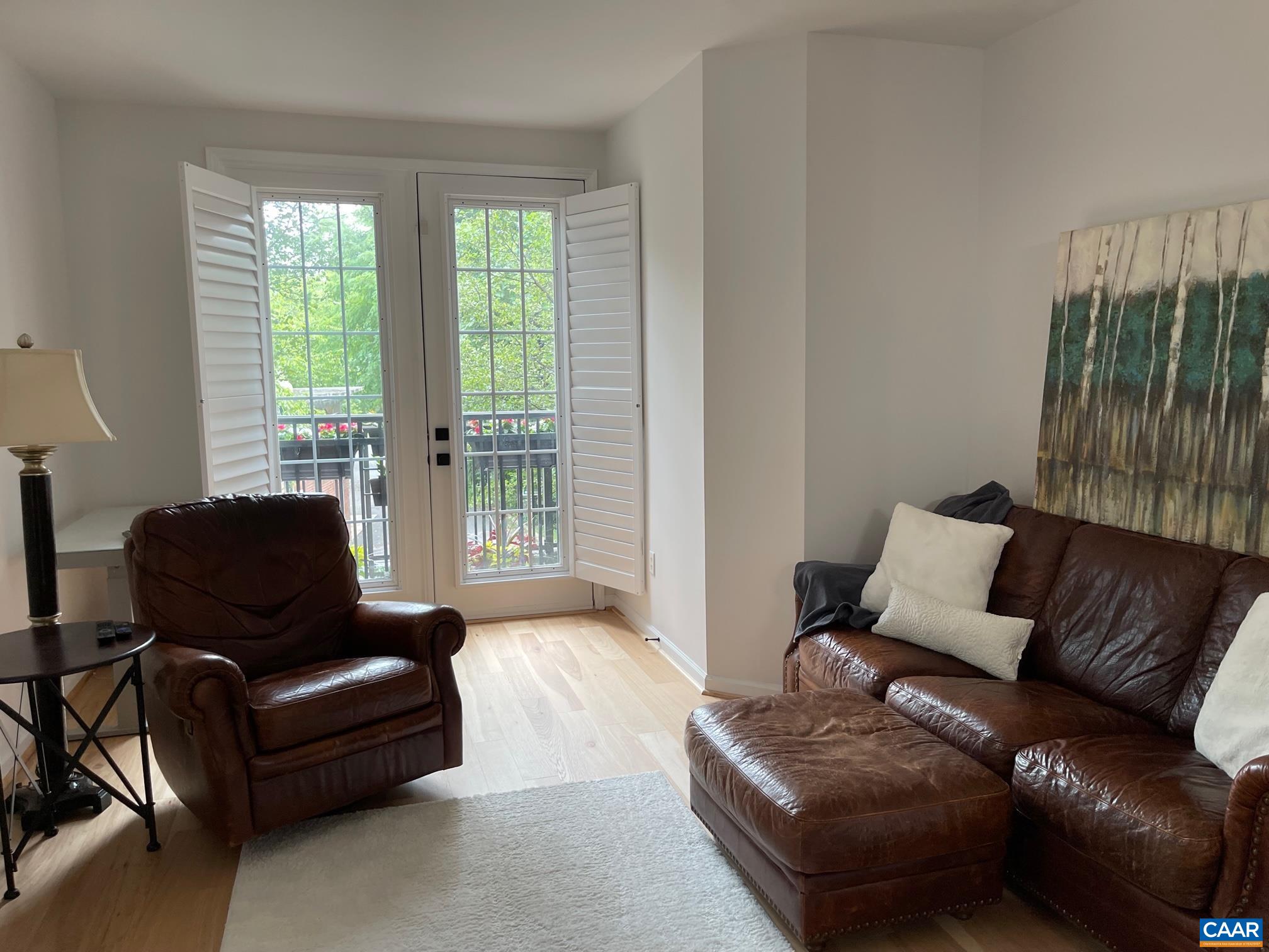 710 Walker Square, Unit 2B Charlottesville, VA 22903 - Photo 5 of 11 a living room with furniture and a large window