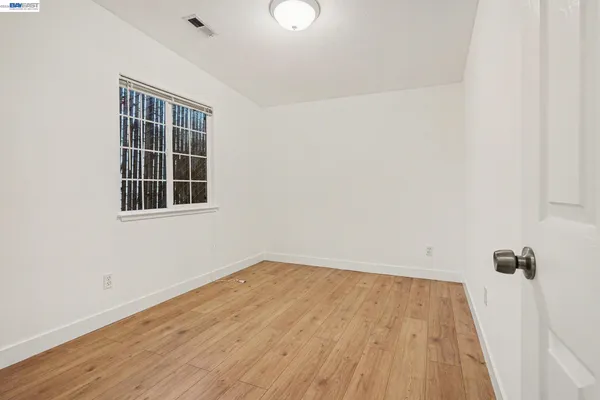 a view of a room that has a window in it