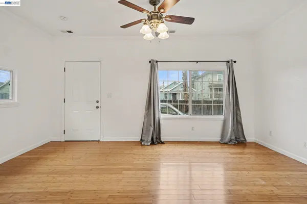 a view of an empty room with a window