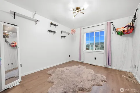 a view of a storage & utility room with washer and dryer