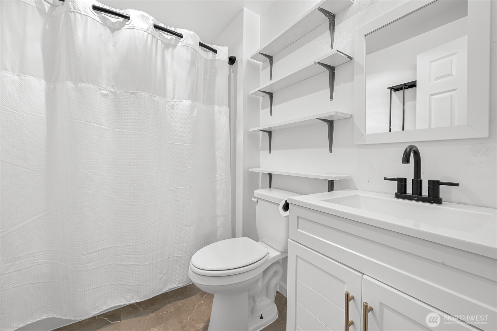 512 Allison Way Nooksack, WA 98276 - Photo 21 of 37 a bathroom with a sink a toilet and shower