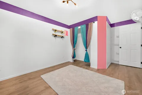 a view of yard with swimming pool and green space