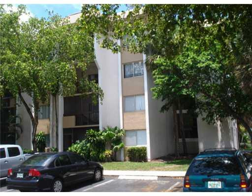 711 North Pine Island Road, Unit 103 Plantation, FL 33324 - Photo 1 of 8 Exterior Front