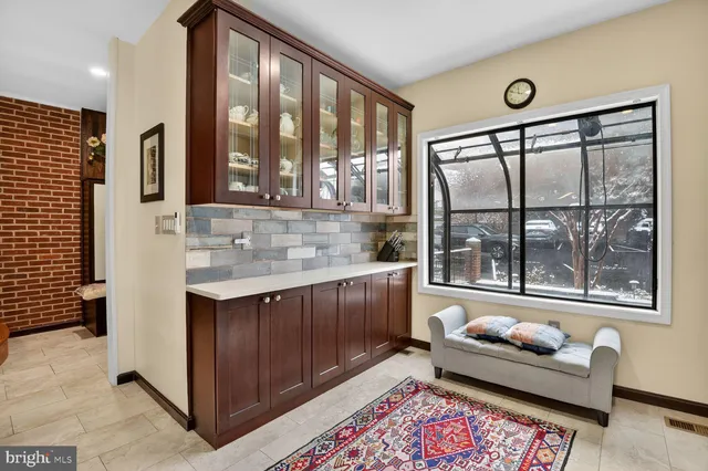 a view of living room with furniture and window