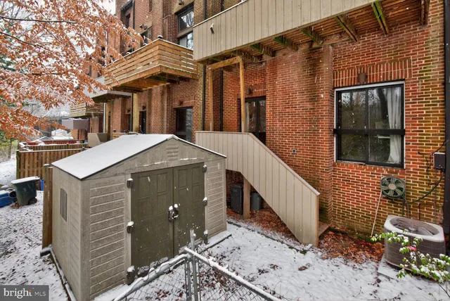 a front view of a house with parking area