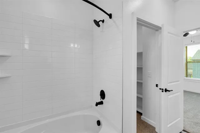 a bathroom with a bathtub