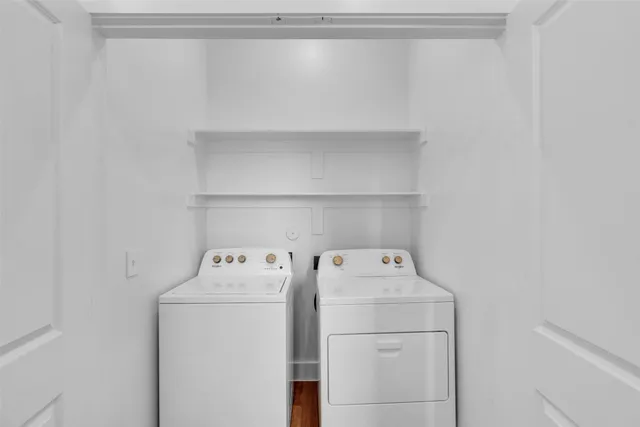a utility room with dryer and washer