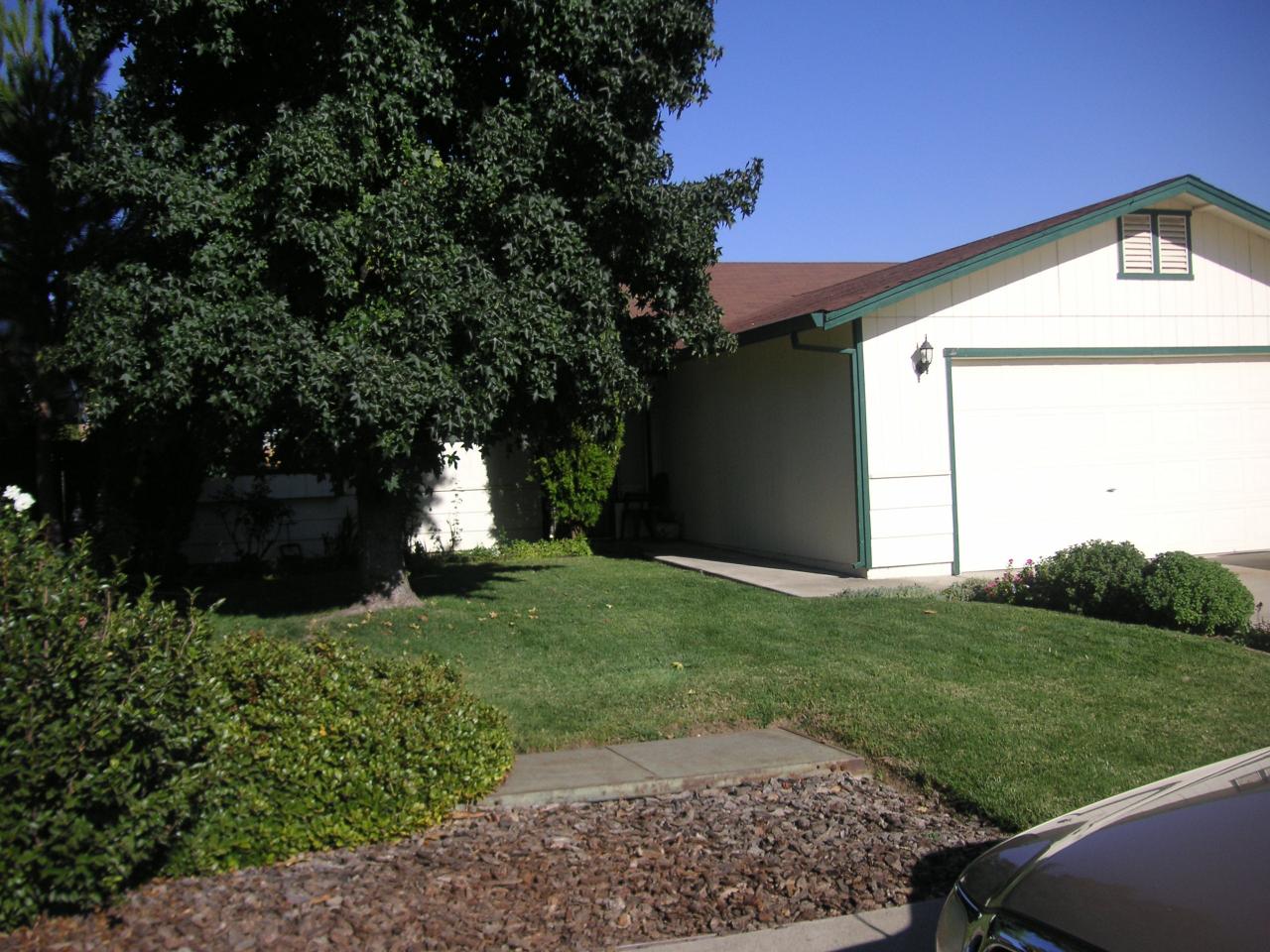7067 Pit Road Redding, CA 96001 - Photo 2 of 11 a view of a back yard of the house