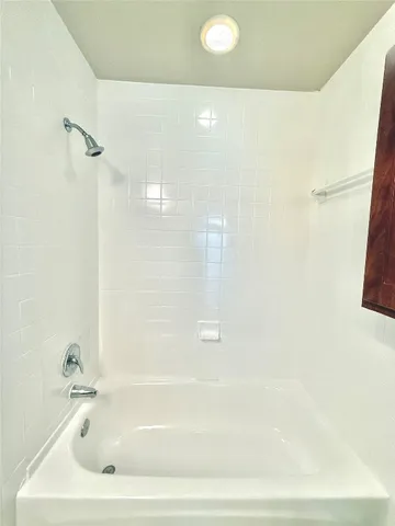 a bathroom with a tub