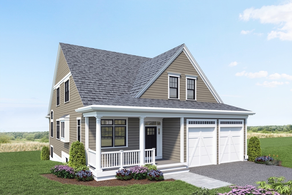 9 Adams Lane, Unit 9 Sherborn, MA 01770 - Photo 23 of 26 a front view of a house with garden