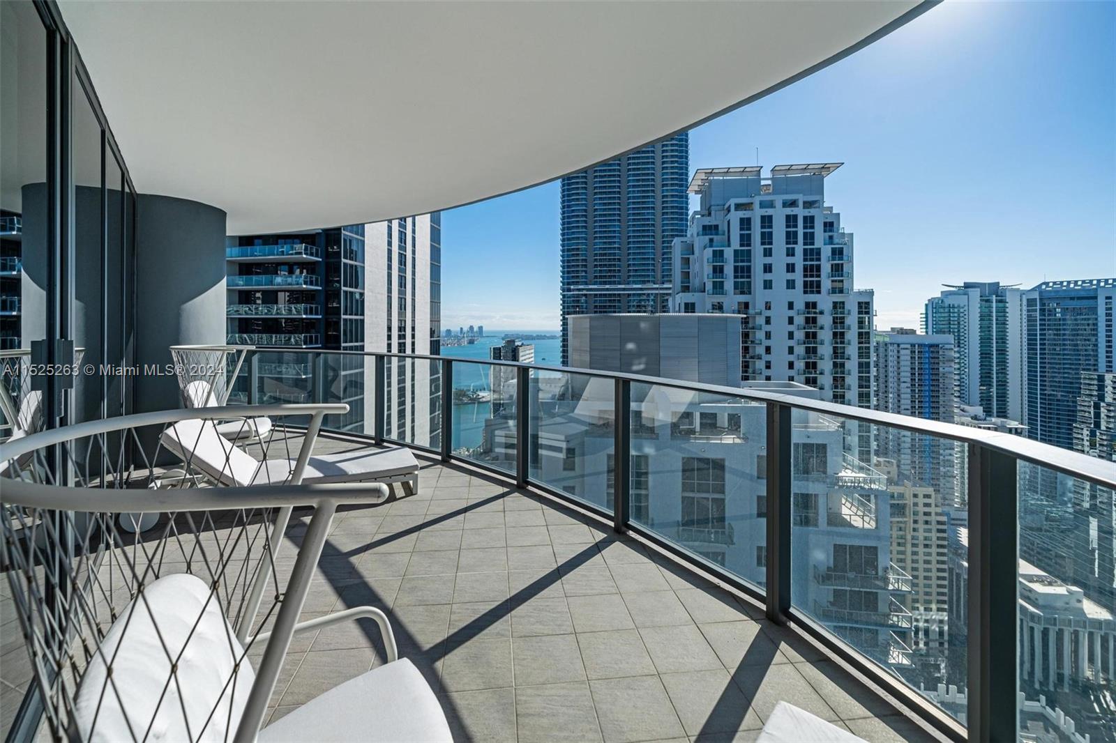 1000 Brickell Plaza, Unit 4101 Miami, FL 33131 - Photo 13 of 24 a balcony view with a outdoor seating space