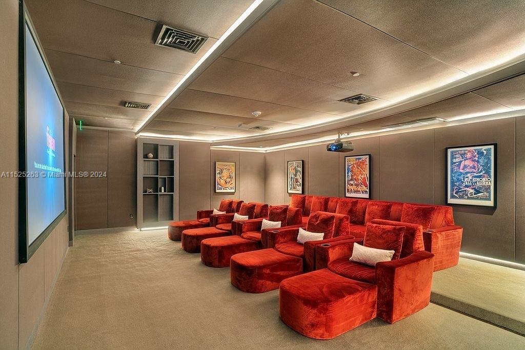 1000 Brickell Plaza, Unit 4101 Miami, FL 33131 - Photo 22 of 24 a media room with lots of chairs and a projector