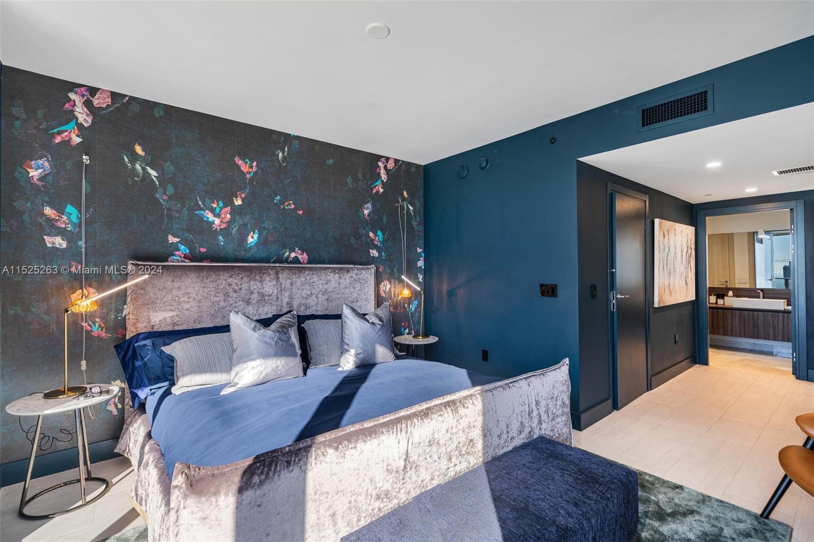 1000 Brickell Plaza, Unit 4101 Miami, FL 33131 - Photo 6 of 24 a living room with furniture and a flat screen tv