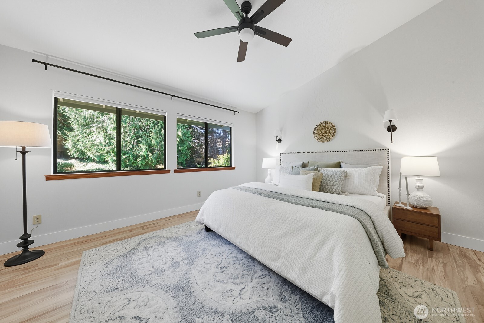 2750 214th Street Southwest Brier, WA 98036 - Photo 21 of 39 a bedroom with a large bed and a window