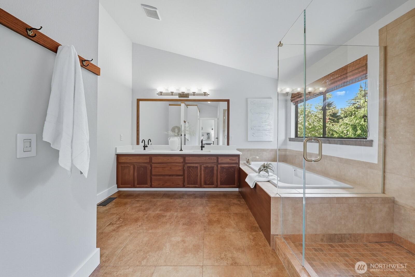 2750 214th Street Southwest Brier, WA 98036 - Photo 23 of 39 a bathroom with a tub sink and mirror
