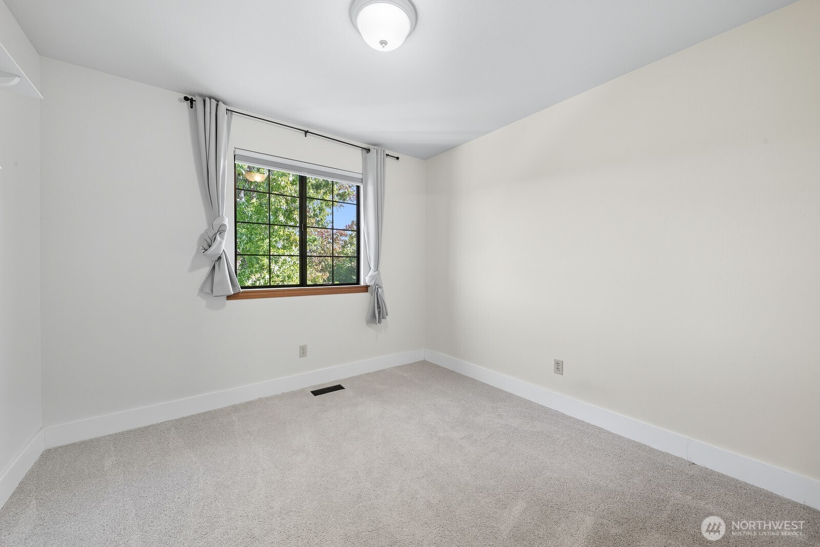 2750 214th Street Southwest Brier, WA 98036 - Photo 29 of 39 an empty room with a window