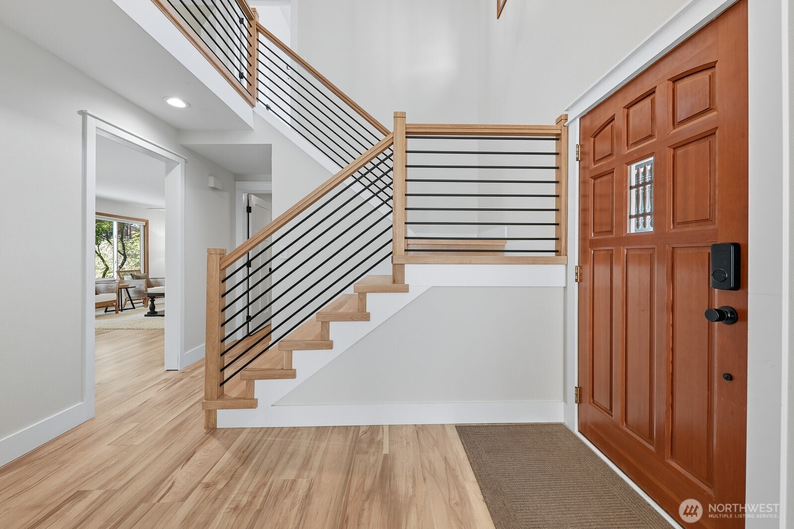 2750 214th Street Southwest Brier, WA 98036 - Photo 3 of 39 a view of entryway with wooden floor and stairs