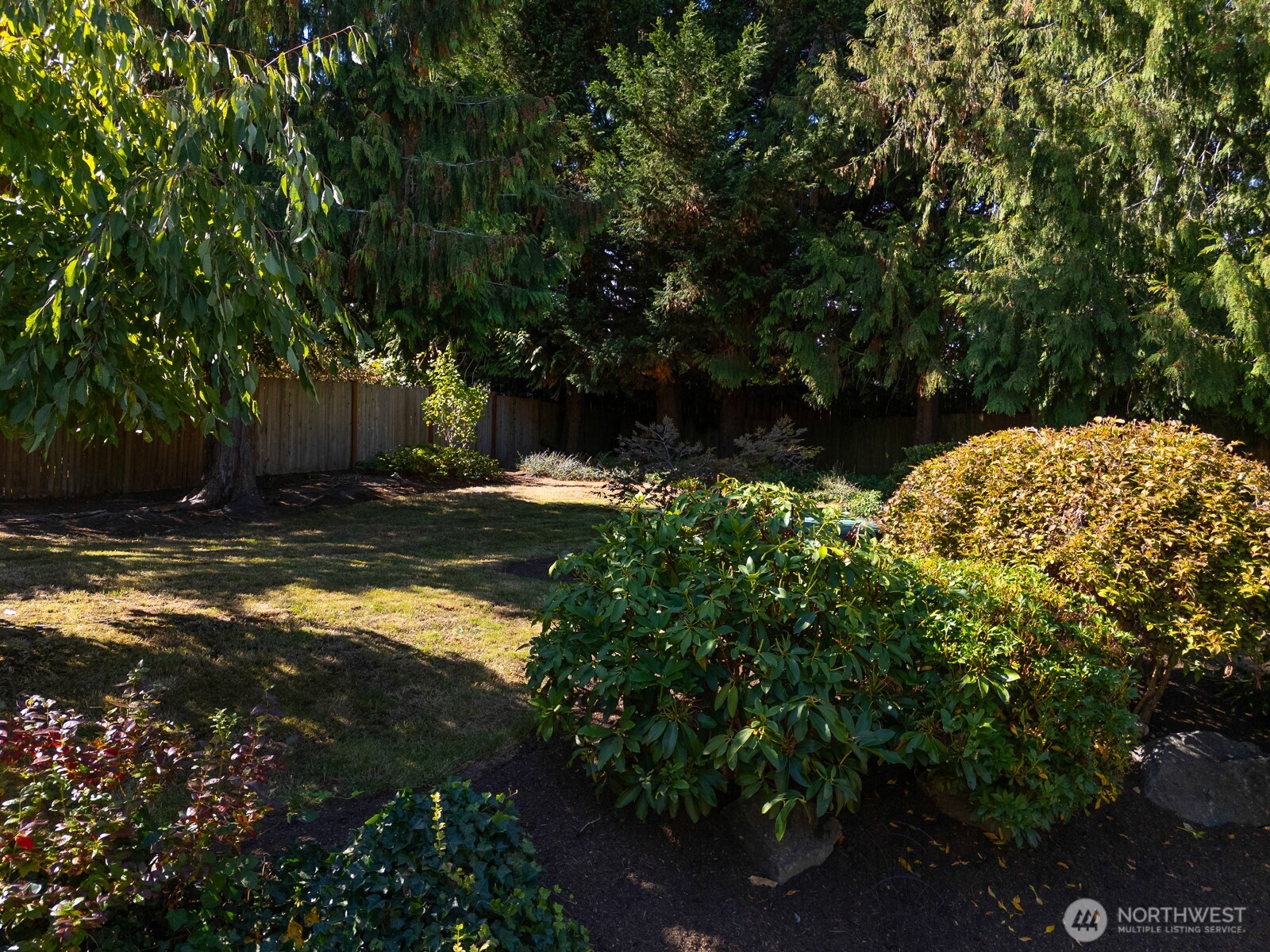 2750 214th Street Southwest Brier, WA 98036 - Photo 34 of 39 a backyard of a house with lots of green space