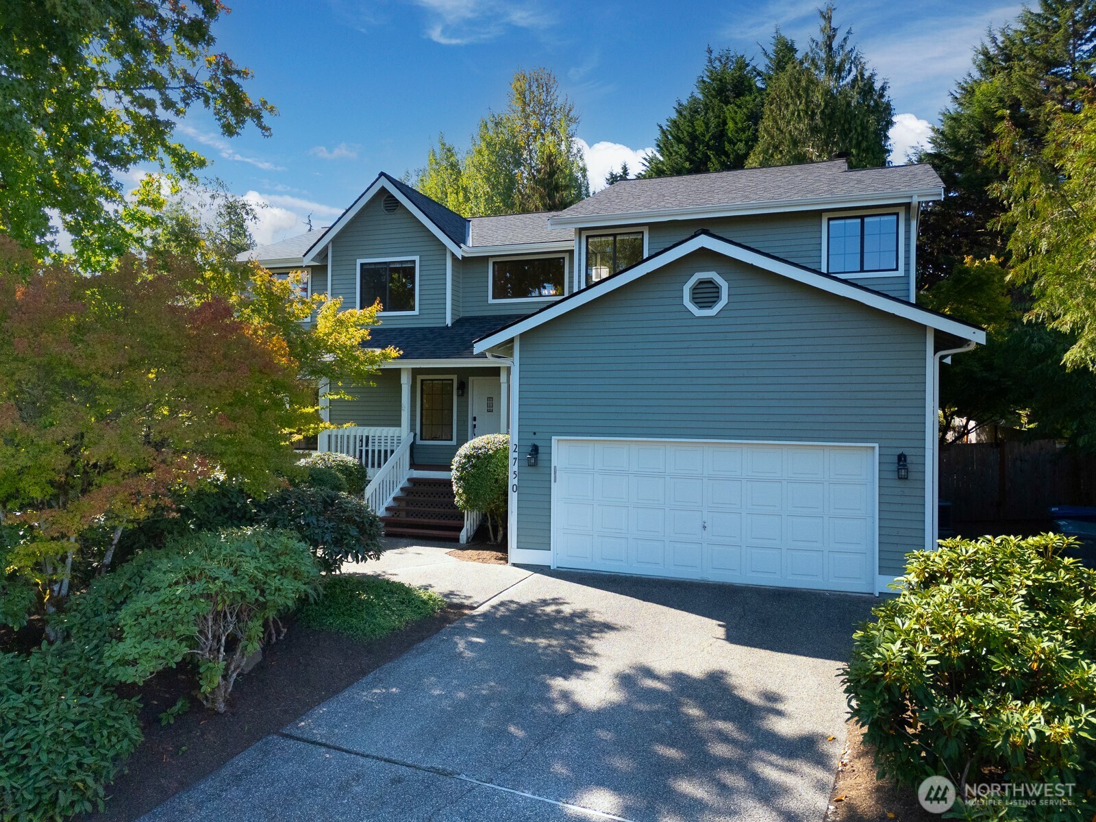 2750 214th Street Southwest Brier, WA 98036 - Photo 39 of 39 a front view of a house with a yard and garage