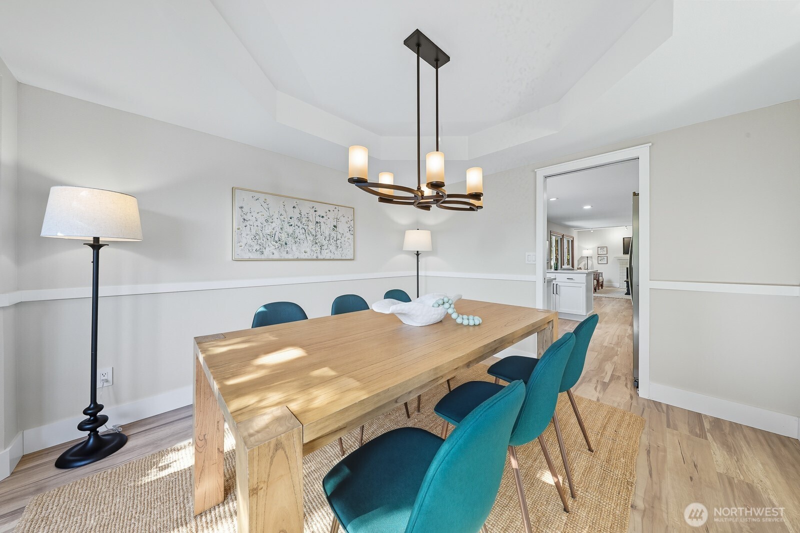 2750 214th Street Southwest Brier, WA 98036 - Photo 10 of 39 a view of a dining room with furniture and a chandelier