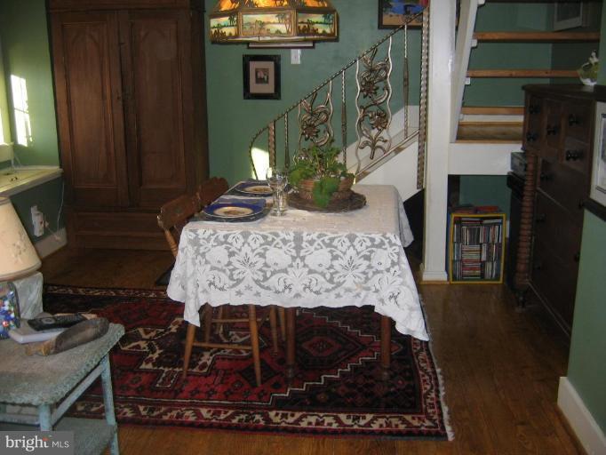 3808 Beckleysville Road Hampstead, MD 21074 - Photo 13 of 28 a living room with furniture and a fireplace