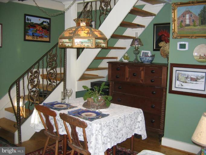 3808 Beckleysville Road Hampstead, MD 21074 - Photo 25 of 28 a living room with furniture and a chandelier