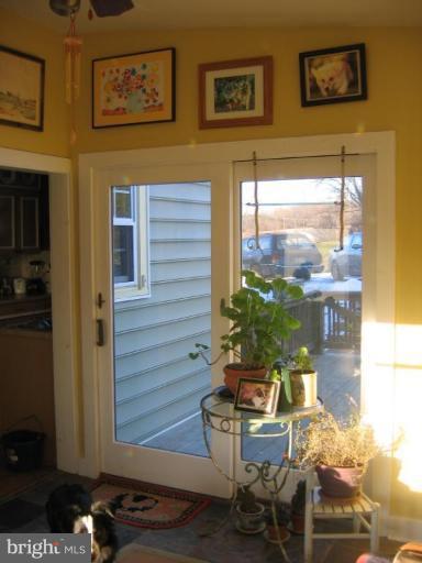 3808 Beckleysville Road Hampstead, MD 21074 - Photo 26 of 28 a balcony with table and chairs