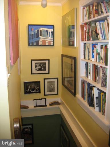 3808 Beckleysville Road Hampstead, MD 21074 - Photo 27 of 28 a hallway with a book shelf