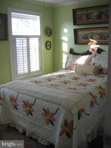 3808 Beckleysville Road Hampstead, MD 21074 - Photo 6 of 28 a bedroom with a bed and a window