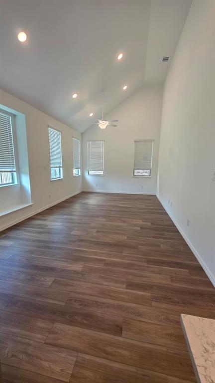 4201 Watson Way North Richland Hills, TX 76180 - Photo 13 of 40 a view of an empty room with wooden floor and a window