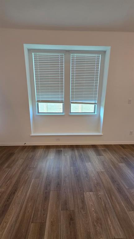 4201 Watson Way North Richland Hills, TX 76180 - Photo 14 of 40 a view of a room with wooden floor and window