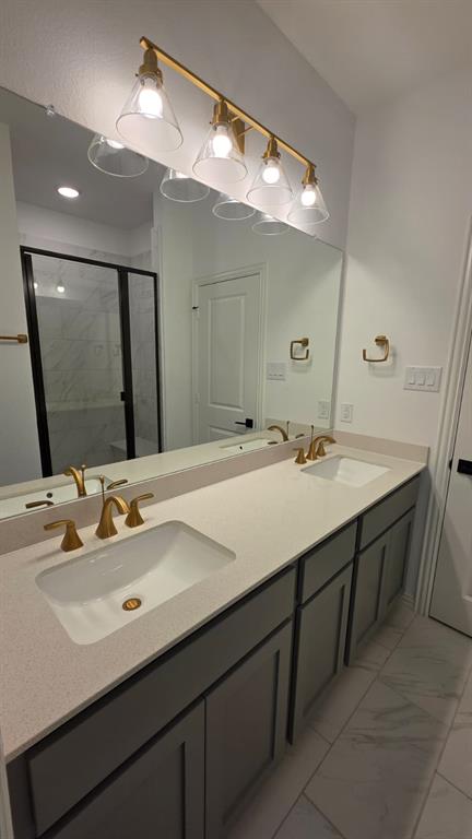 4201 Watson Way North Richland Hills, TX 76180 - Photo 20 of 40 a bathroom with a double vanity sink and a mirror