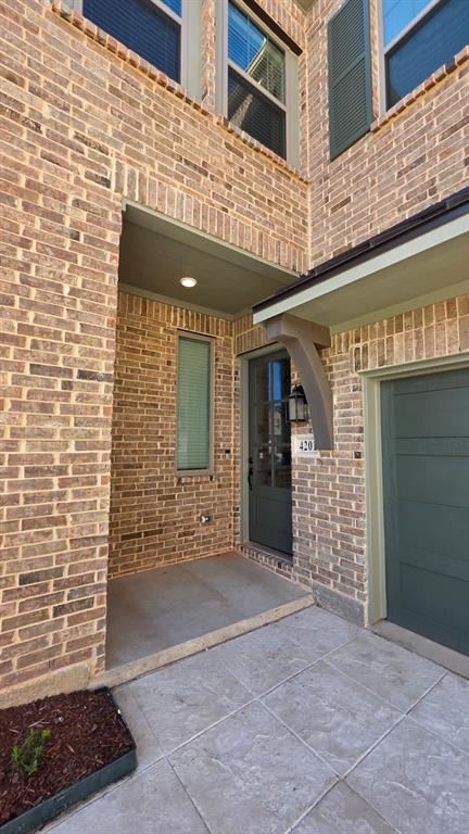 4201 Watson Way North Richland Hills, TX 76180 - Photo 2 of 40 a view of a brick building with large windows
