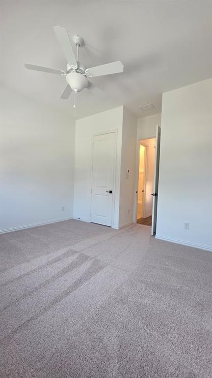 4201 Watson Way North Richland Hills, TX 76180 - Photo 29 of 40 an empty room with a ceiling fan and closet area