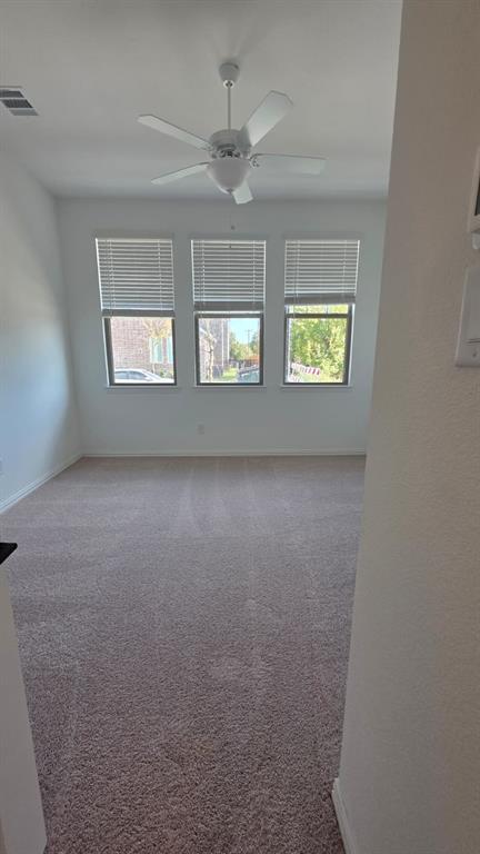 4201 Watson Way North Richland Hills, TX 76180 - Photo 30 of 40 an empty room with windows and ceiling fan