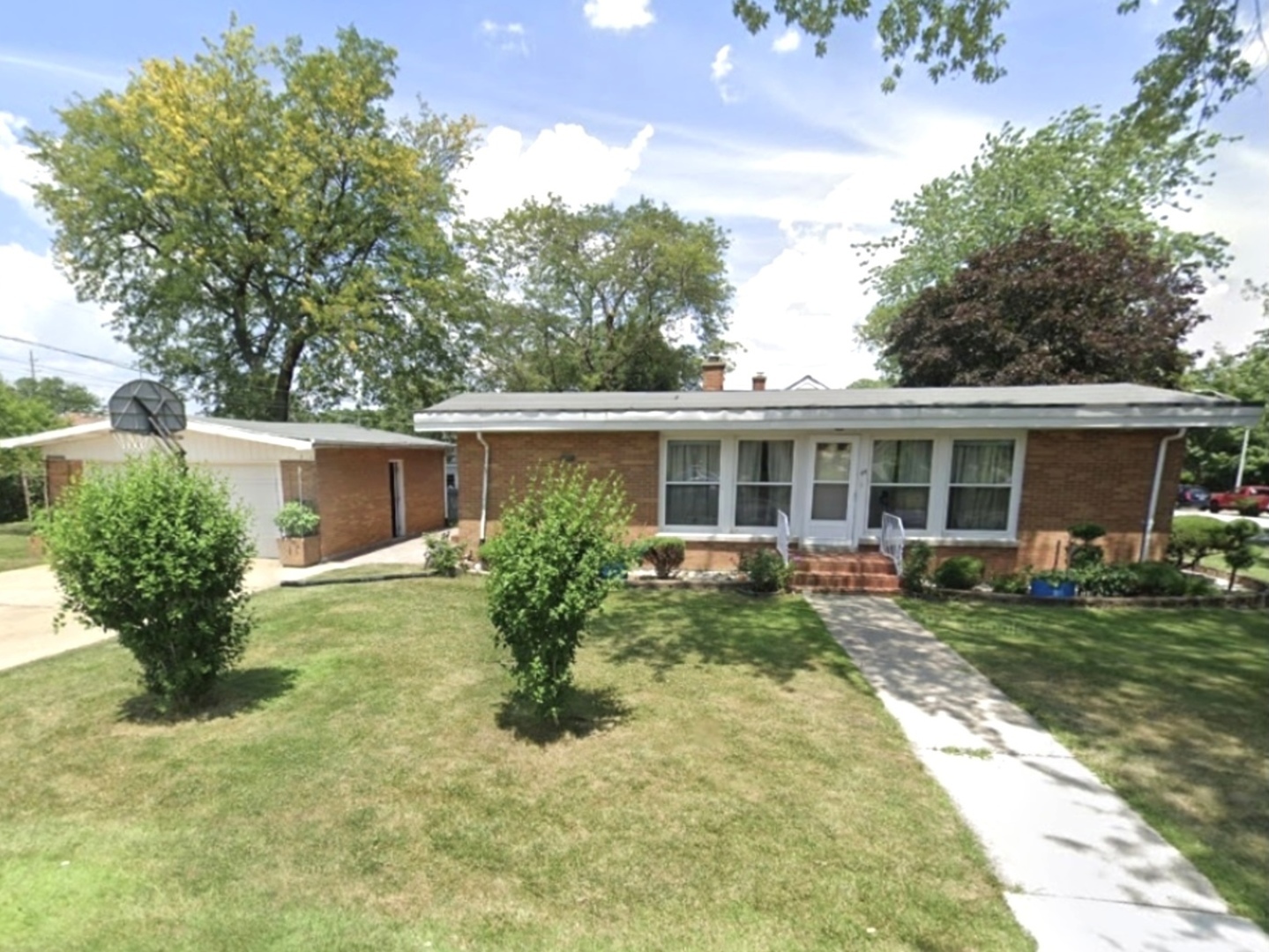 44 Iowa Avenue Addison, IL 60101 - Photo 2 of 31 a front view of house with yard and green space