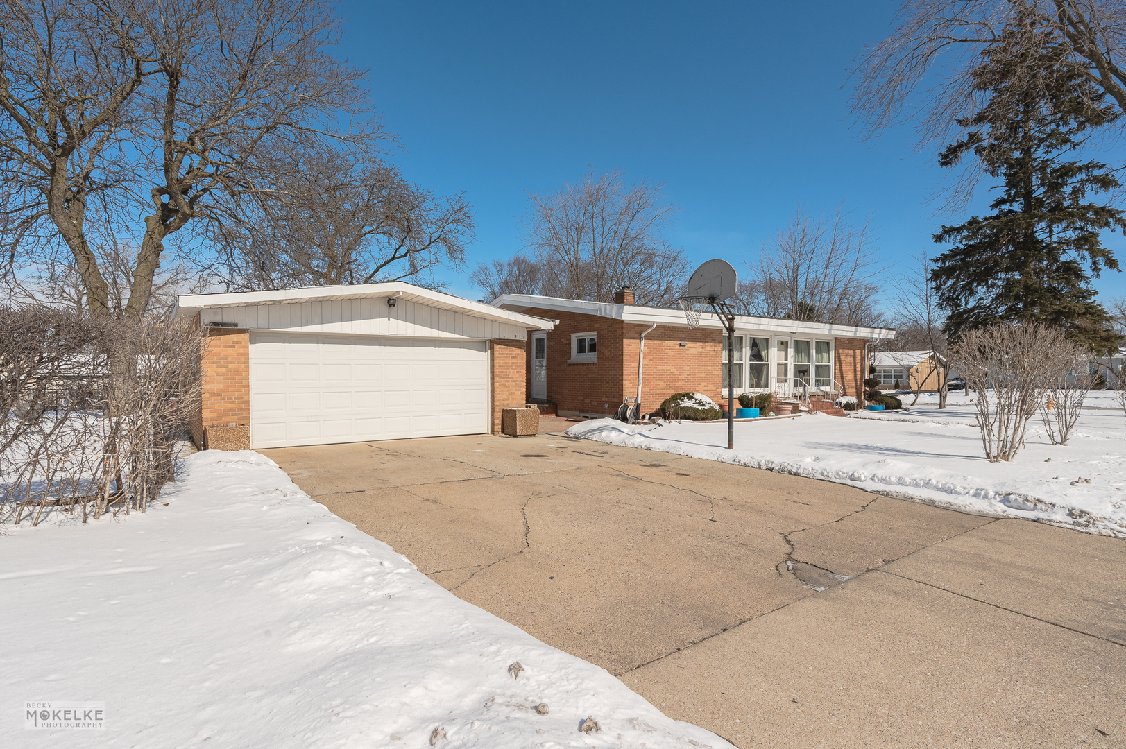 44 Iowa Avenue Addison, IL 60101 - Photo 3 of 31 a front view of a house with a yard and a garage