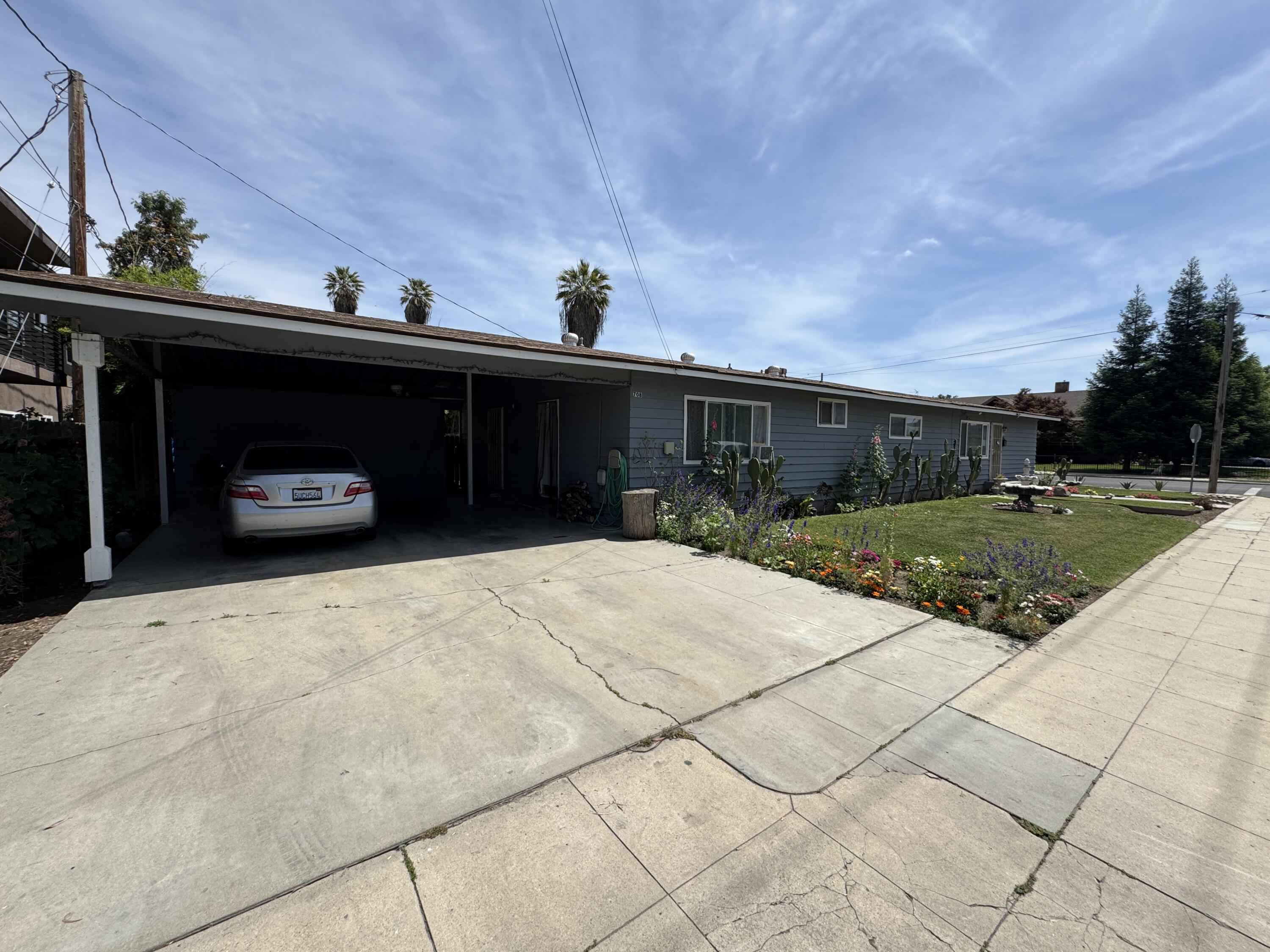 704 North Floral Street Visalia, CA 93291 - Photo 7 of 51 a view of outdoor space and yard