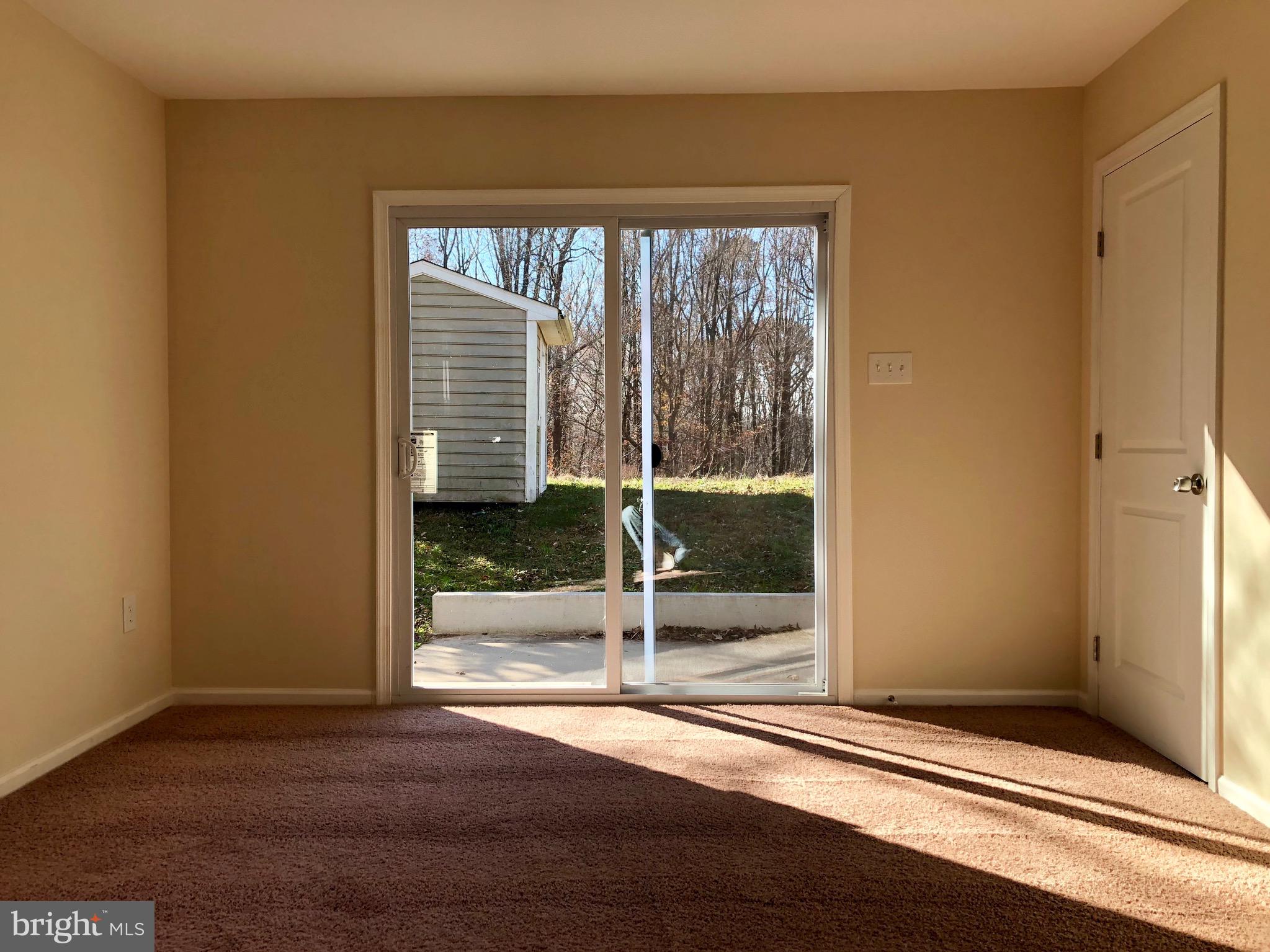 522 Maple Way Lusby, MD 20657 - Photo 22 of 42 Master Bedroom Walk Out Patio