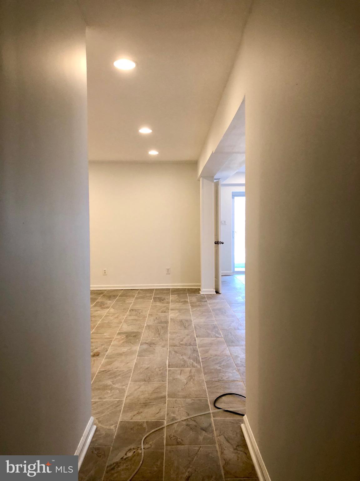 522 Maple Way Lusby, MD 20657 - Photo 34 of 42 Lower Level Hall