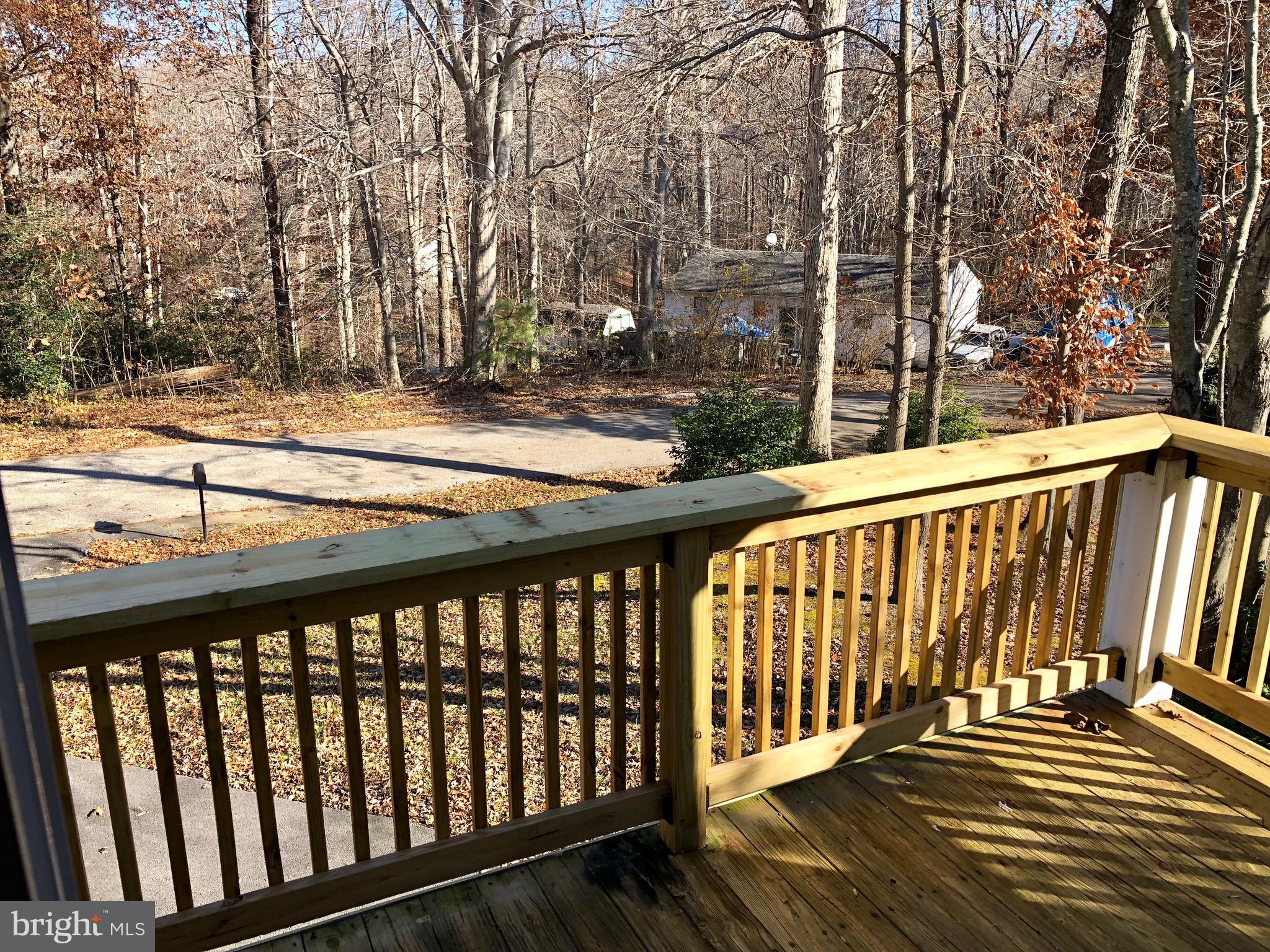 522 Maple Way Lusby, MD 20657 - Photo 7 of 42 Front Deck Off Kitchen