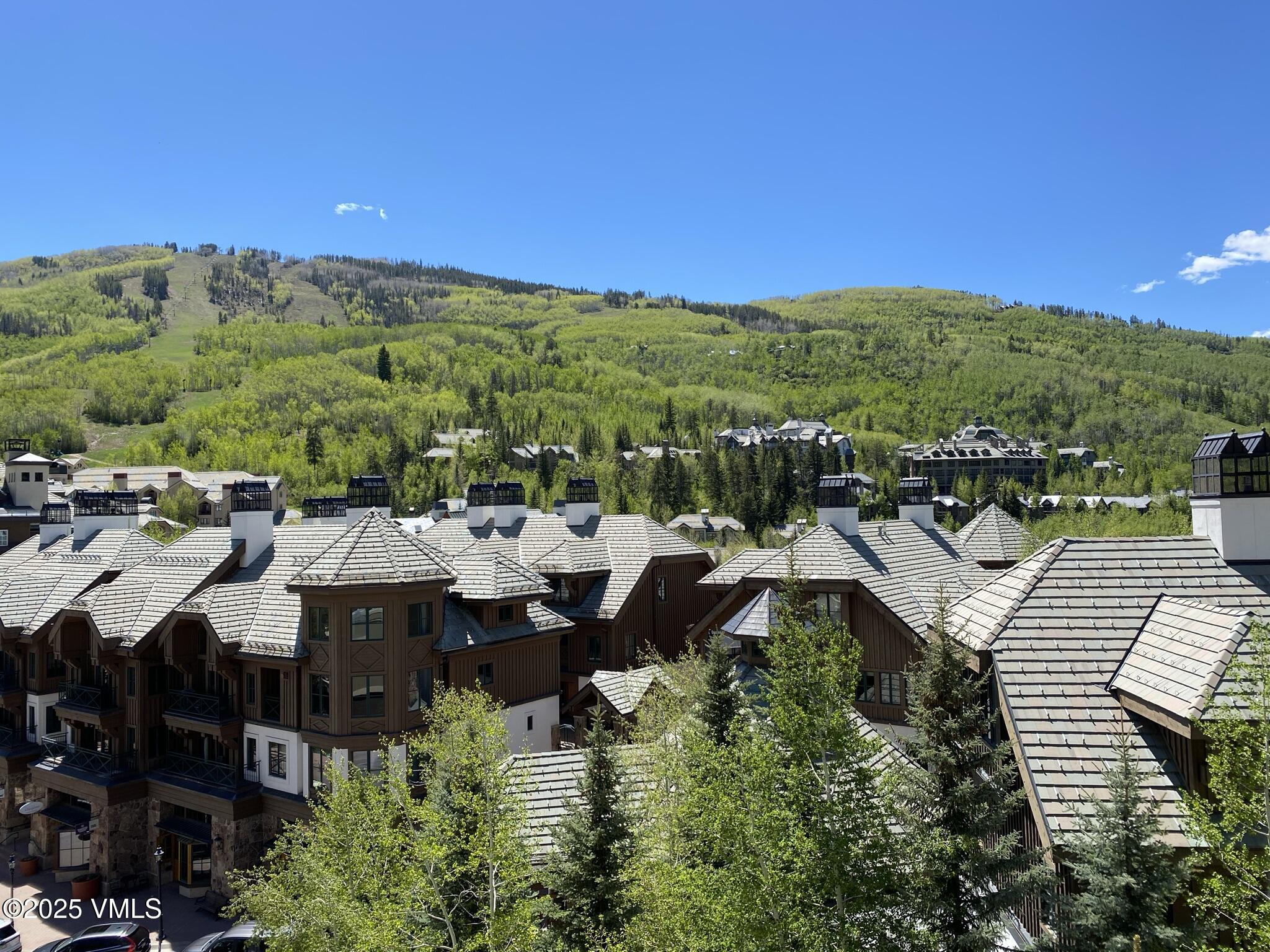 210 Offerson Road, Unit 207 WEEK 34 Beaver Creek, CO 81620 - Photo 3 of 26 a terrace with outdoor seating and city view