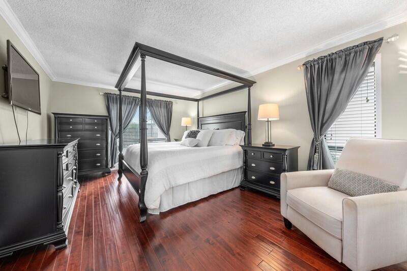 509 Dotterel Road, Unit 23C Delray Beach, FL 33444 - Photo 7 of 15 08_509DotterelRd_Apt23C_14_PrimaryBedroo