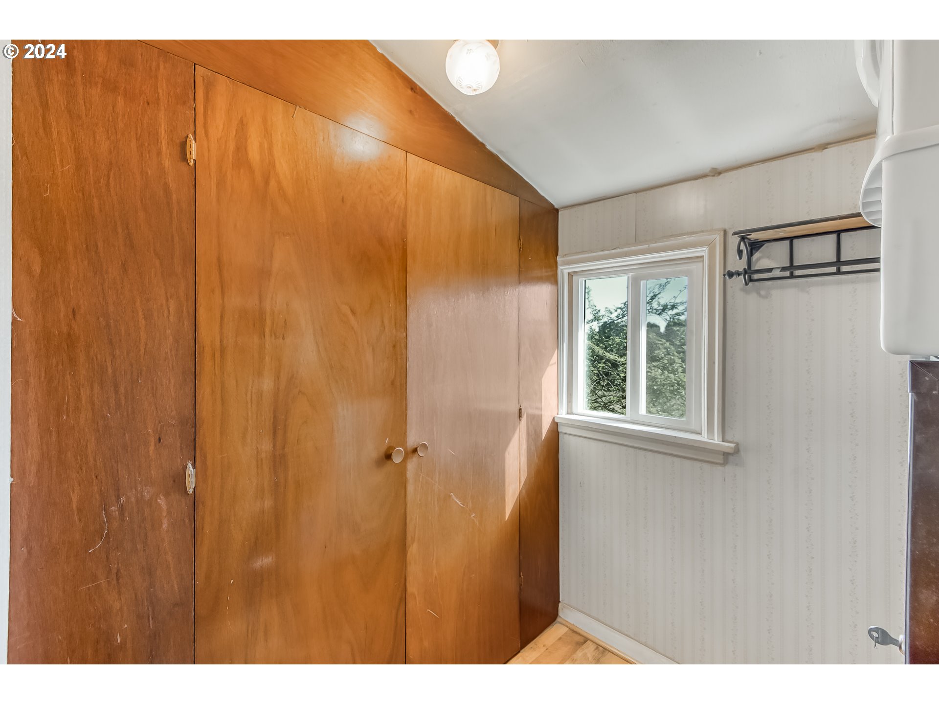 25888 South Rhoten Road Aurora, OR 97002 - Photo 24 of 34 a view of a bathroom with a shower curtain and a window