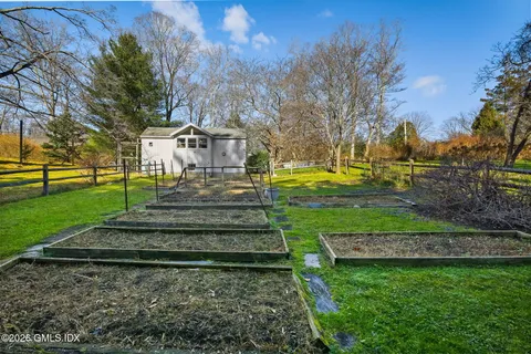 a view of a park with houses