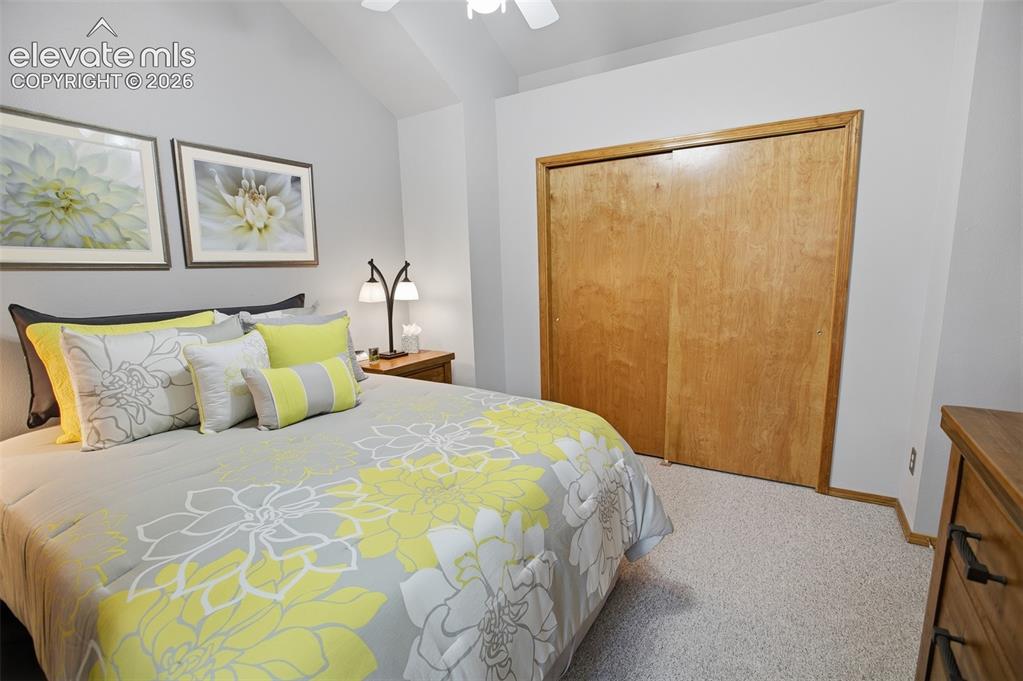877 North Mountain Estates Road Florissant, CO 80816 - Photo 17 of 23 a bedroom with a bed and painting on the wall