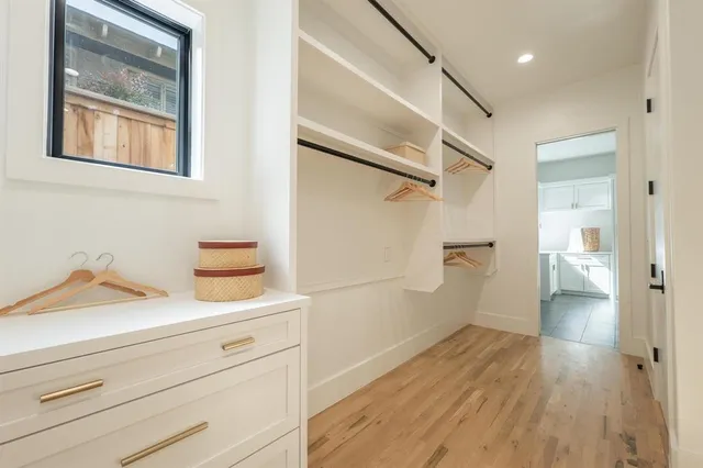 a bathroom with a shower and a sink