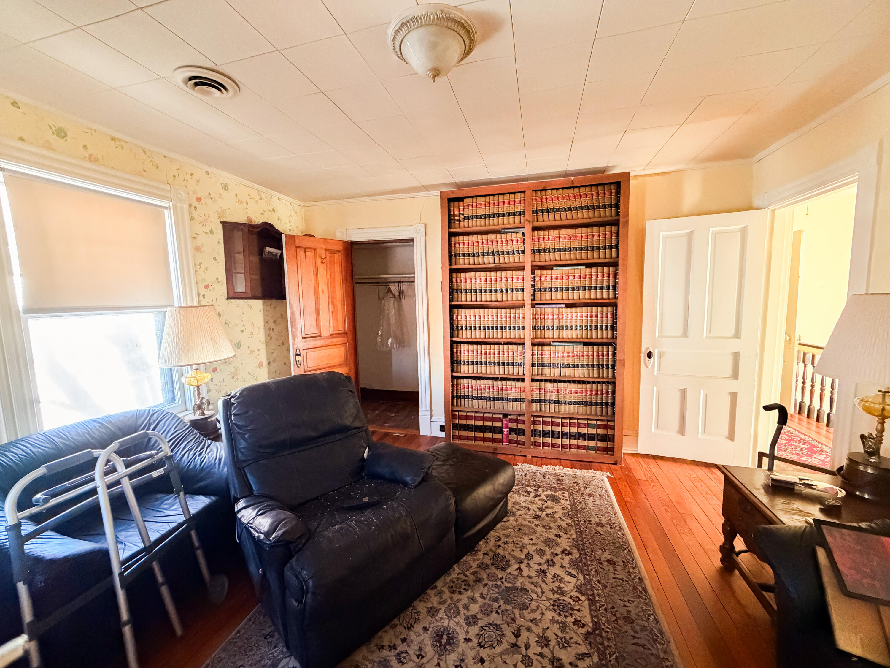 226 West Locust Street Covington, VA 24426 - Photo 25 of 45 a living room with furniture and a window