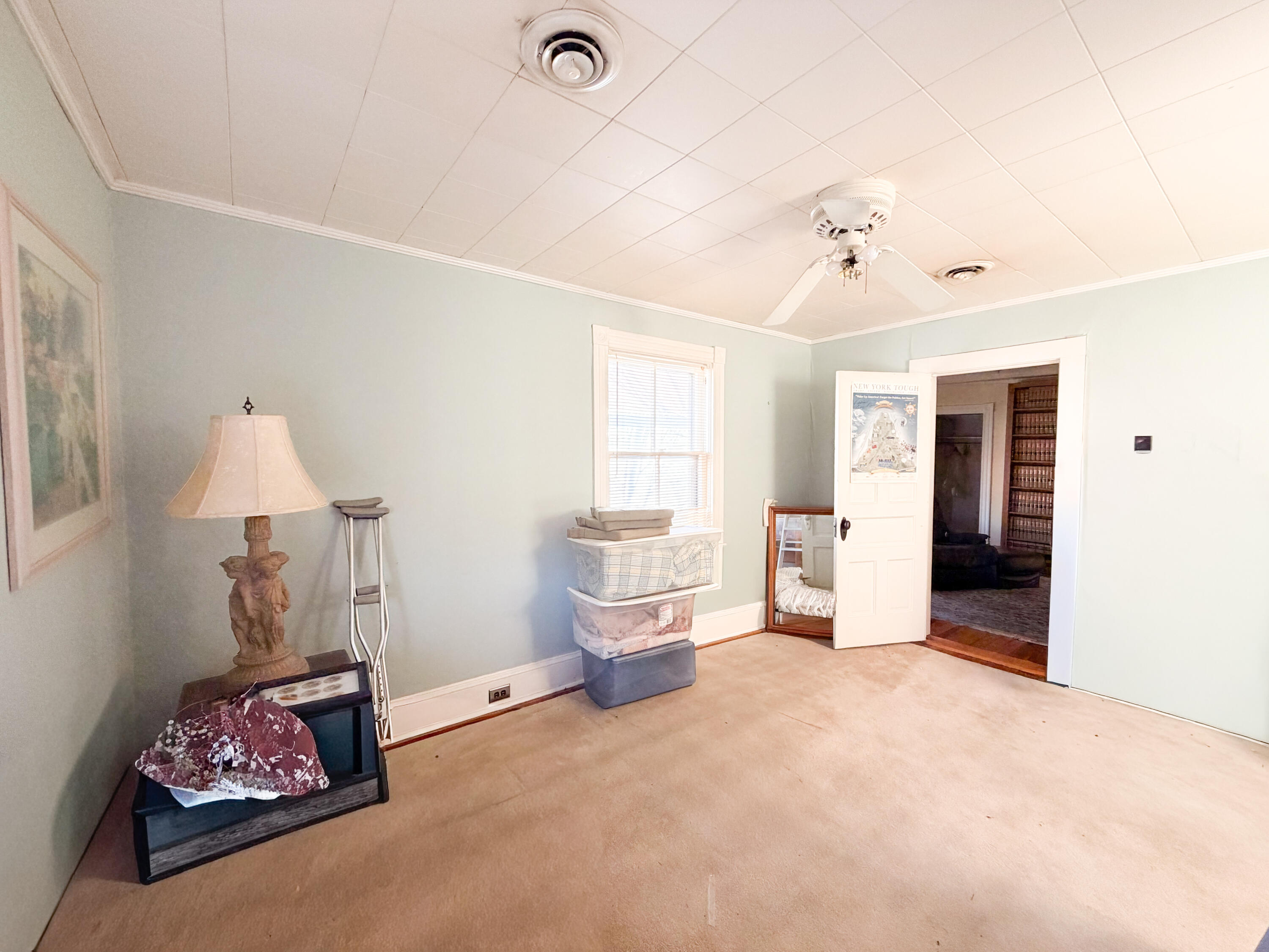226 West Locust Street Covington, VA 24426 - Photo 28 of 45 a living room with furniture and a window